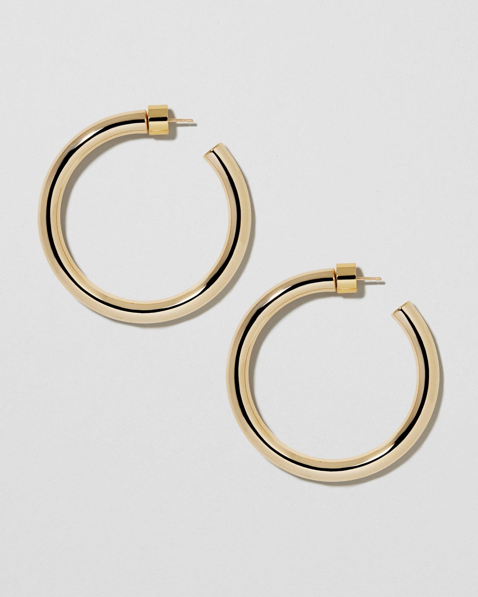 1.5" Natasha Baby Hoops earring - styled on model | gold hoop earrings