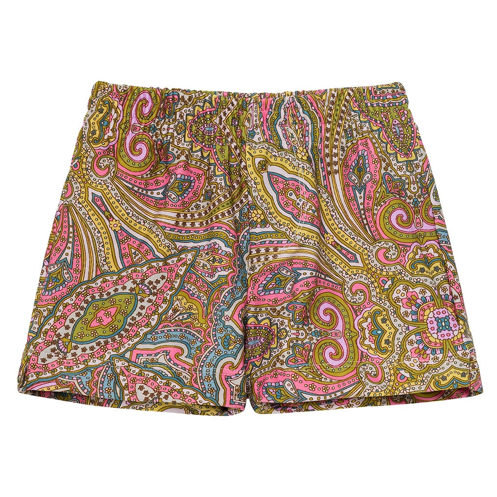Swim trunks with multicolored paisley pattern featuring pink, gold, green, and blue swirls and decorative details.