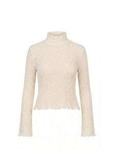 Cream textured turtleneck long-sleeve top with scalloped trim at hemline and cuffs.