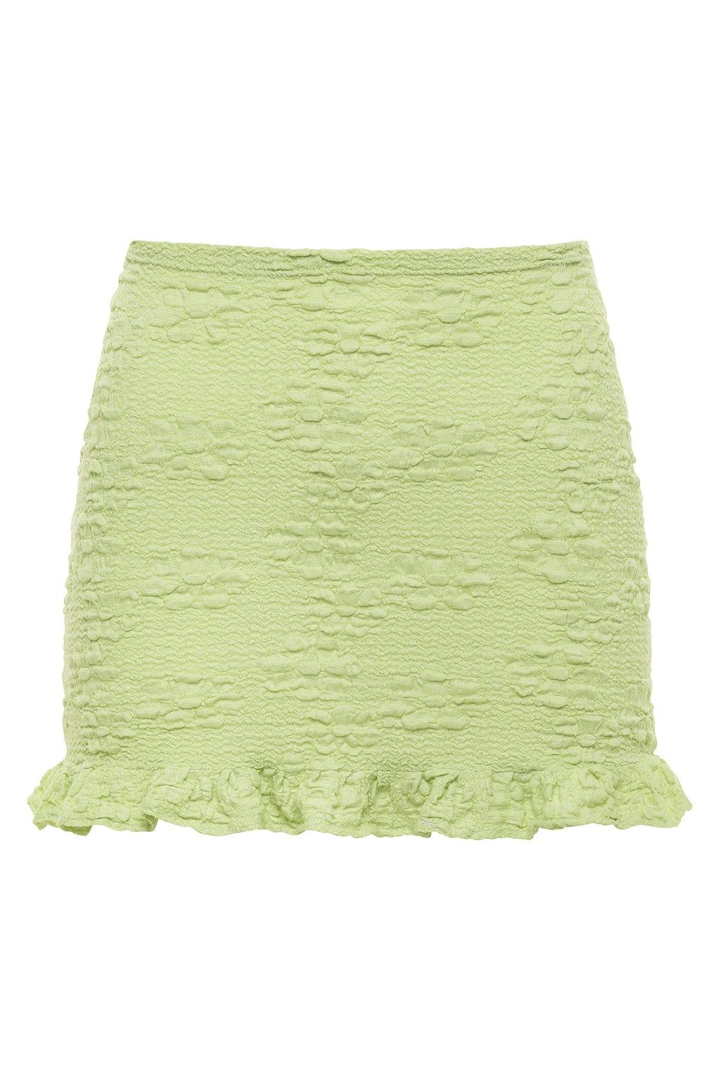 Lime green textured micro skirt with ruffle trim at the hem.