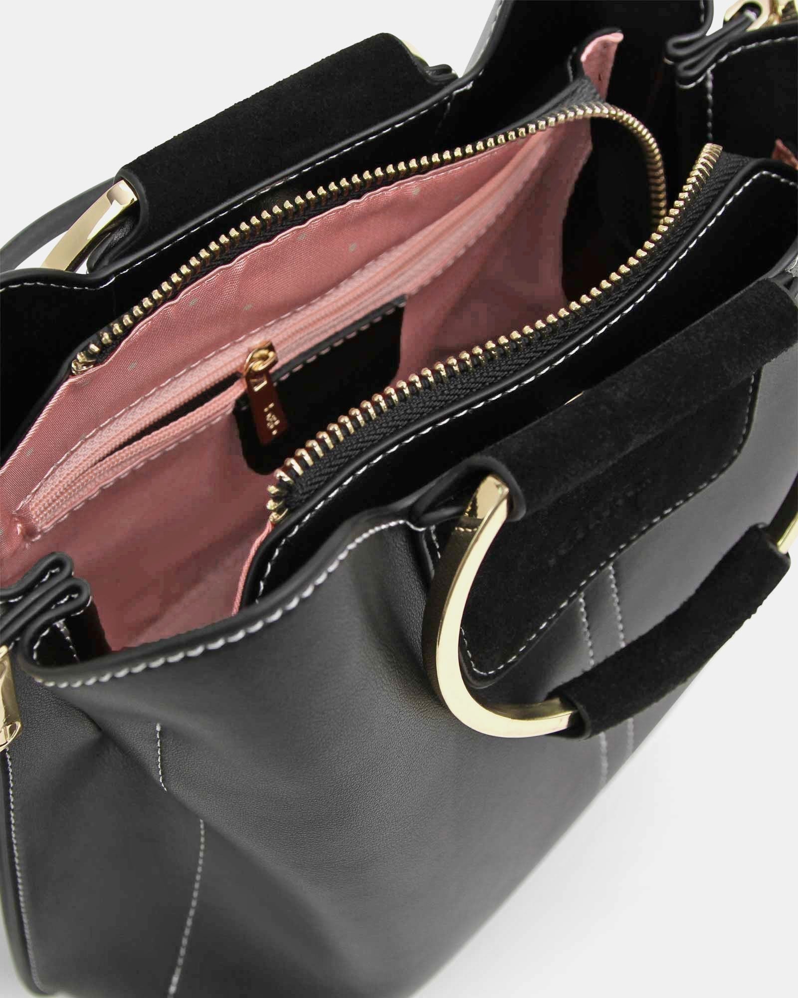 Black-leather-bag-inside-detail_3ed90b1f-b527-4c20-9596-10cb302b2559.jpg