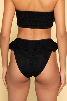 Black crochet bikini bottom with ruffle detail at the waistband.
