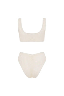 Bone-colored crochet one-piece swimsuit with textured knit fabric, scoop neckline, and high-waisted bottom.