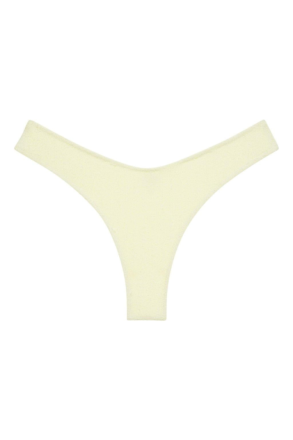 Buttercream ribbed bikini bottom with zig-zag stitching and high-cut leg openings.
