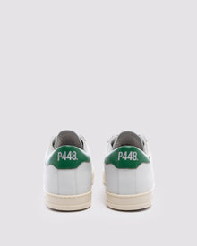 Back angle of white and  green sneakers