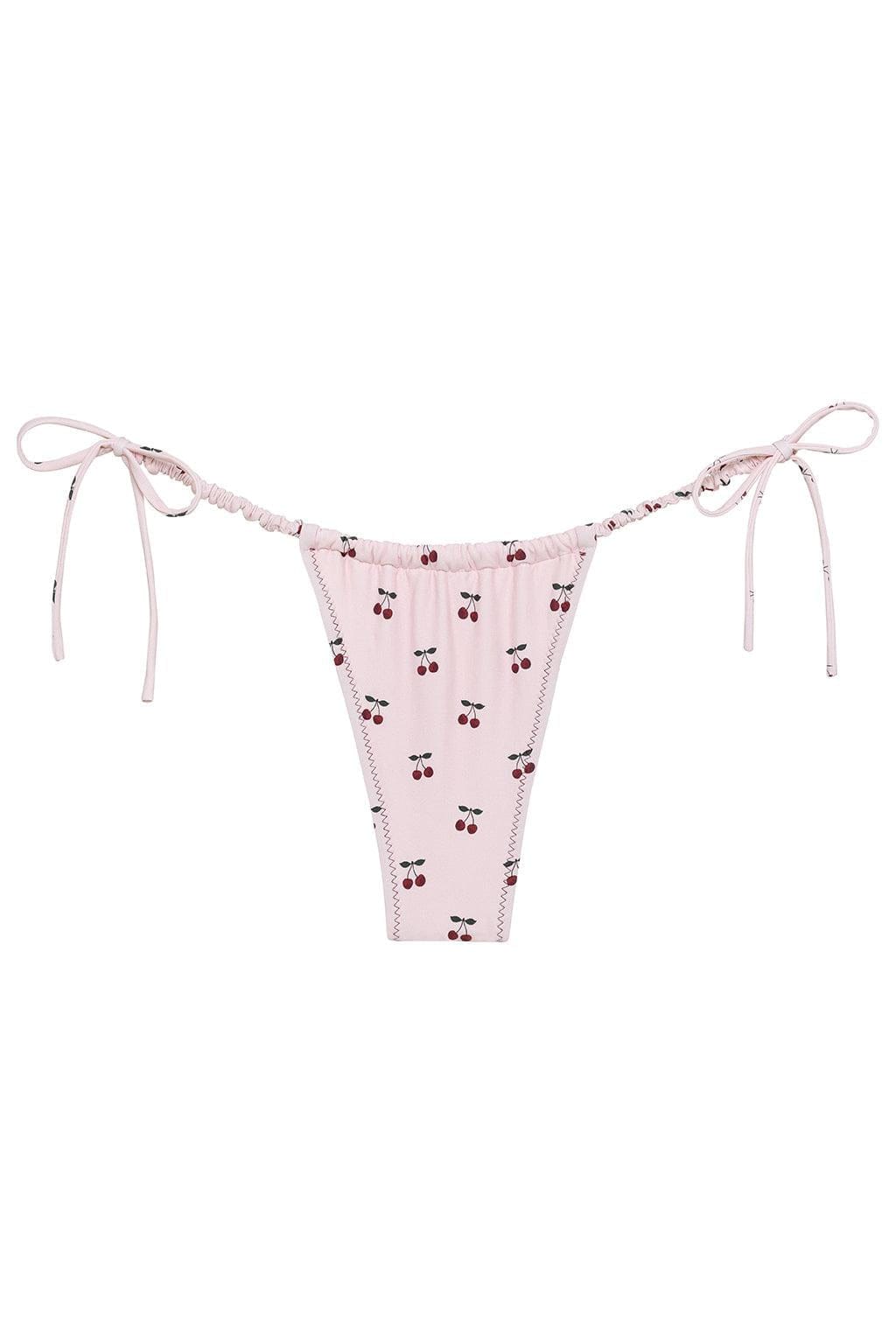Pink bikini bottom with red cherry print and side tie straps with ruched waistband detailing.