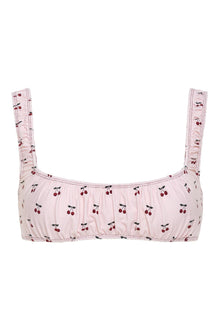 Light pink bikini top with red cherry print and ruched straps, square neckline.