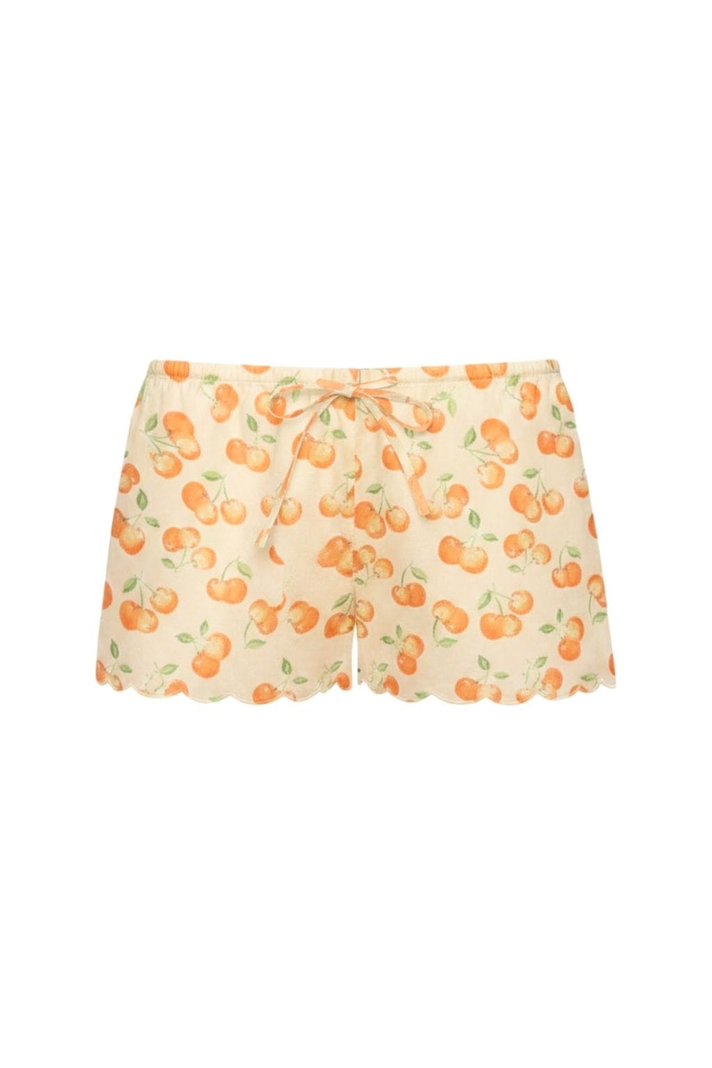 Cream shorts with orange cherry and green leaf print, scalloped edges, and orange drawstring at waist.