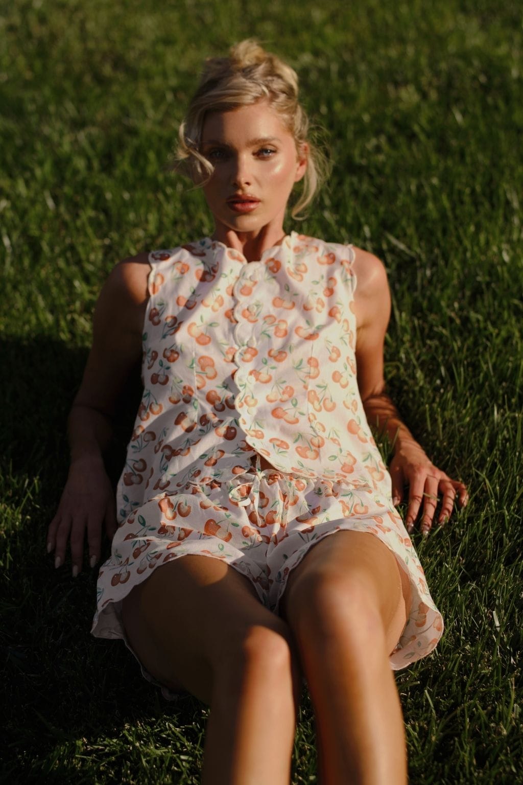 Cream short with cherry print pattern and scalloped edges, shown with drawstring waistband.