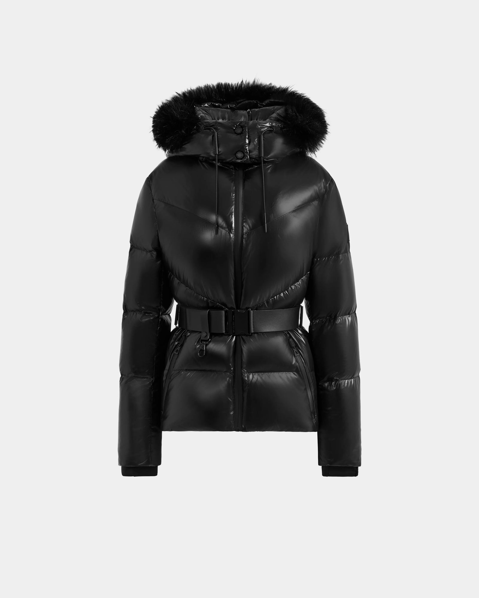 The Rudsak CHRISTELLE S - L125544 Black is a women's down puffer jacket with a belted waist, front zipper, long sleeves, and a hood with black faux fur trim, shown on a light gray background.