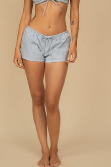 Blue and white striped low-rise shorts with drawstring waist.