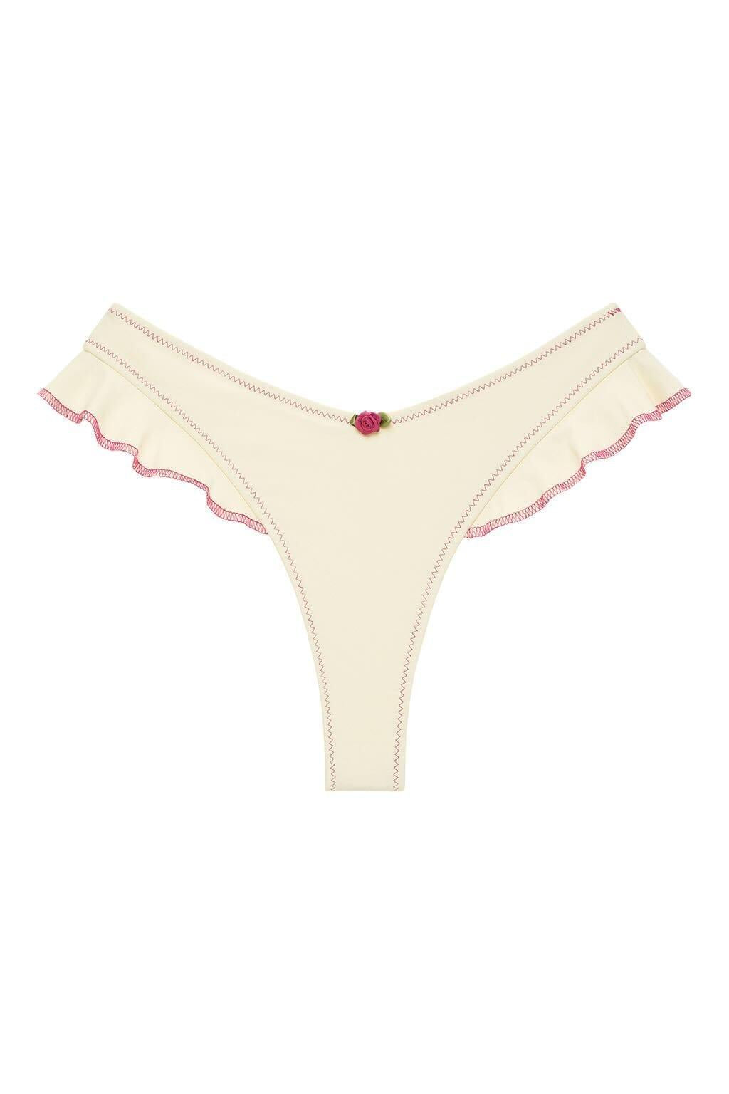 Cream bikini bottom with raspberry-colored binding trim on leg openings and center front detail.