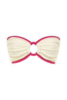 Cream bandeau bikini top with raspberry pink binding and gathered center detail with circular cutout.