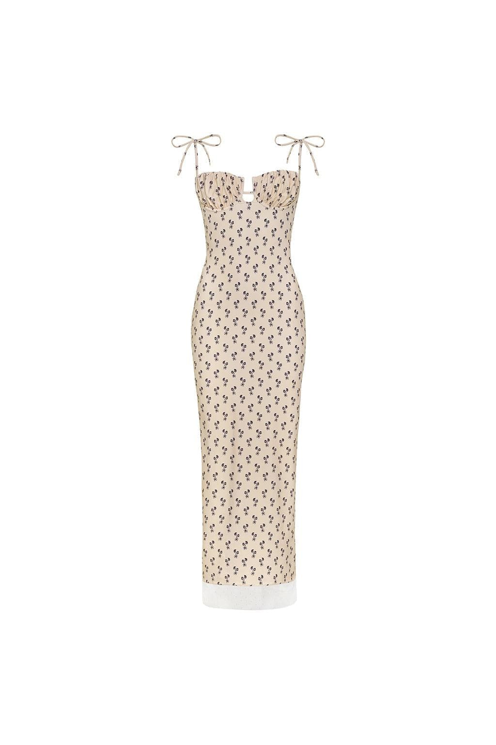 Cream slip dress with small black floral pattern, sweetheart neckline, tie shoulders, and white lace trim hem.