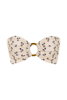 Cream bandeau bikini top with black floral print and gold ring center detail.