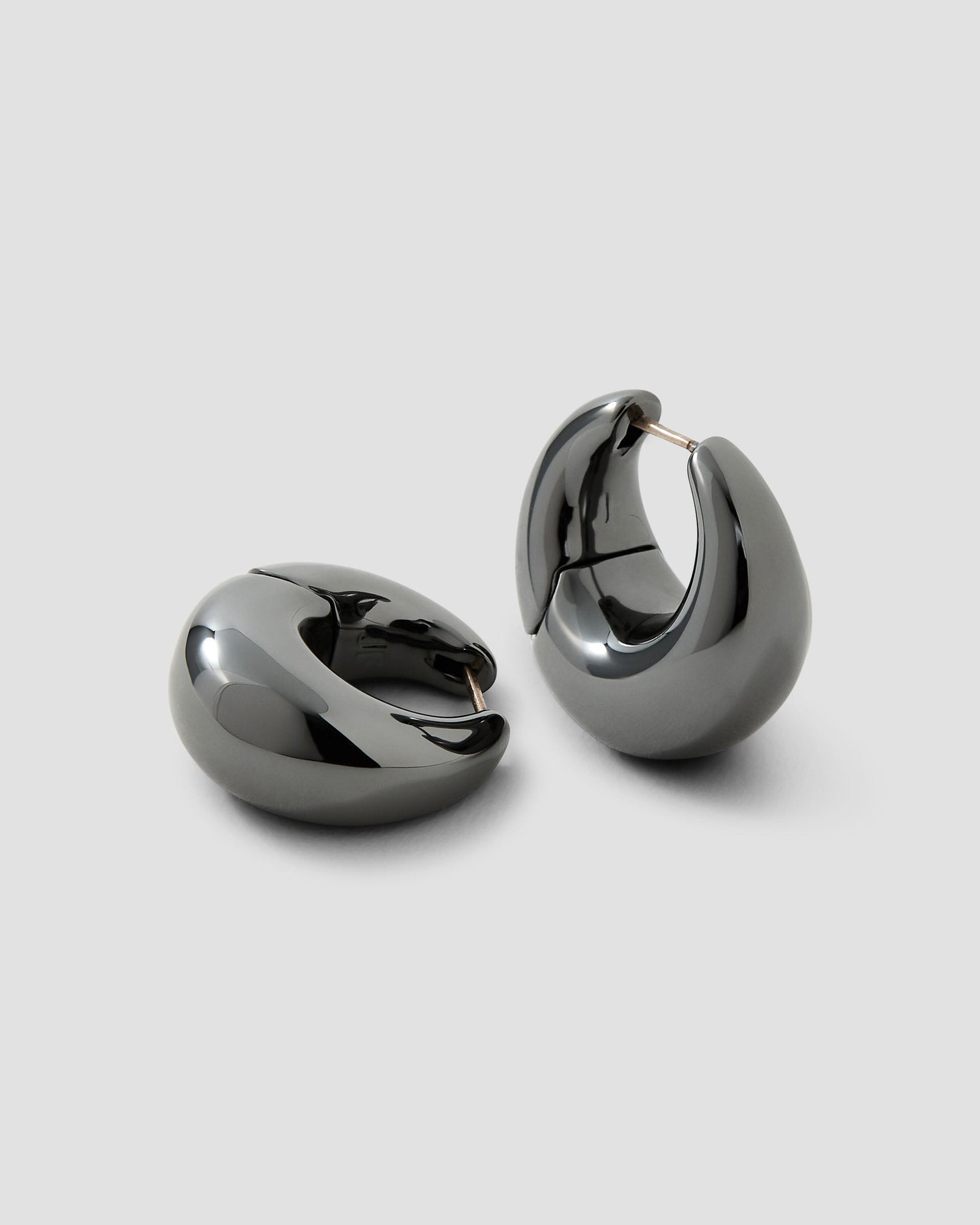 Dylan Micro Huggies earring - alternate angle | gold huggie earrings