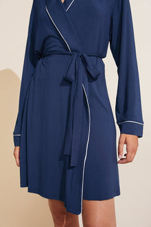 Model is wearing the Gisele TENCEL Modal Robe in navy/ivory.