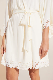 Model wears Naya TENCEL Modal Robe in ivory.
