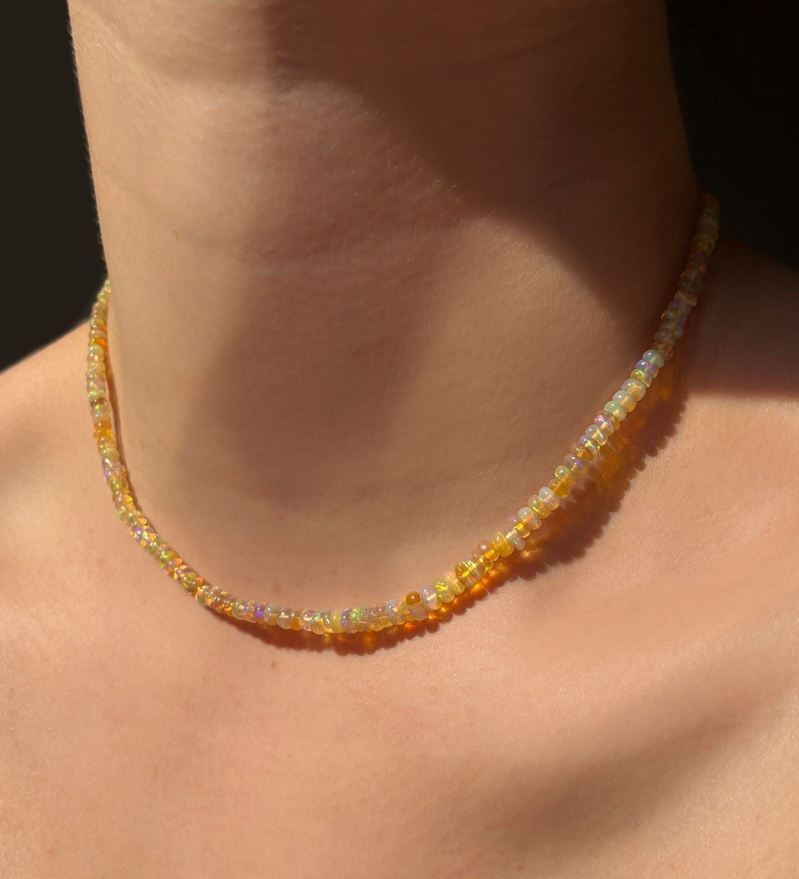 Eclipse Opal Necklace hanging on the neck