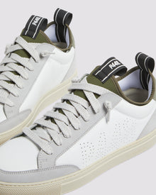 Side angle of white, grey and green sneakers