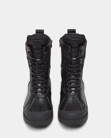 The Rudsak DAMIEN - M222500 Black men’s winter boots feature a black lace-up design, weather-treated leather, high tops, sturdy soles, and visible stitching, shown upright and facing forward on a plain white background.