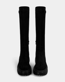 The Rudsak AVOLA - L225514 Black women's knee-high boots in faux suede feature chunky lug soles and are shown from the front against a plain light gray background.