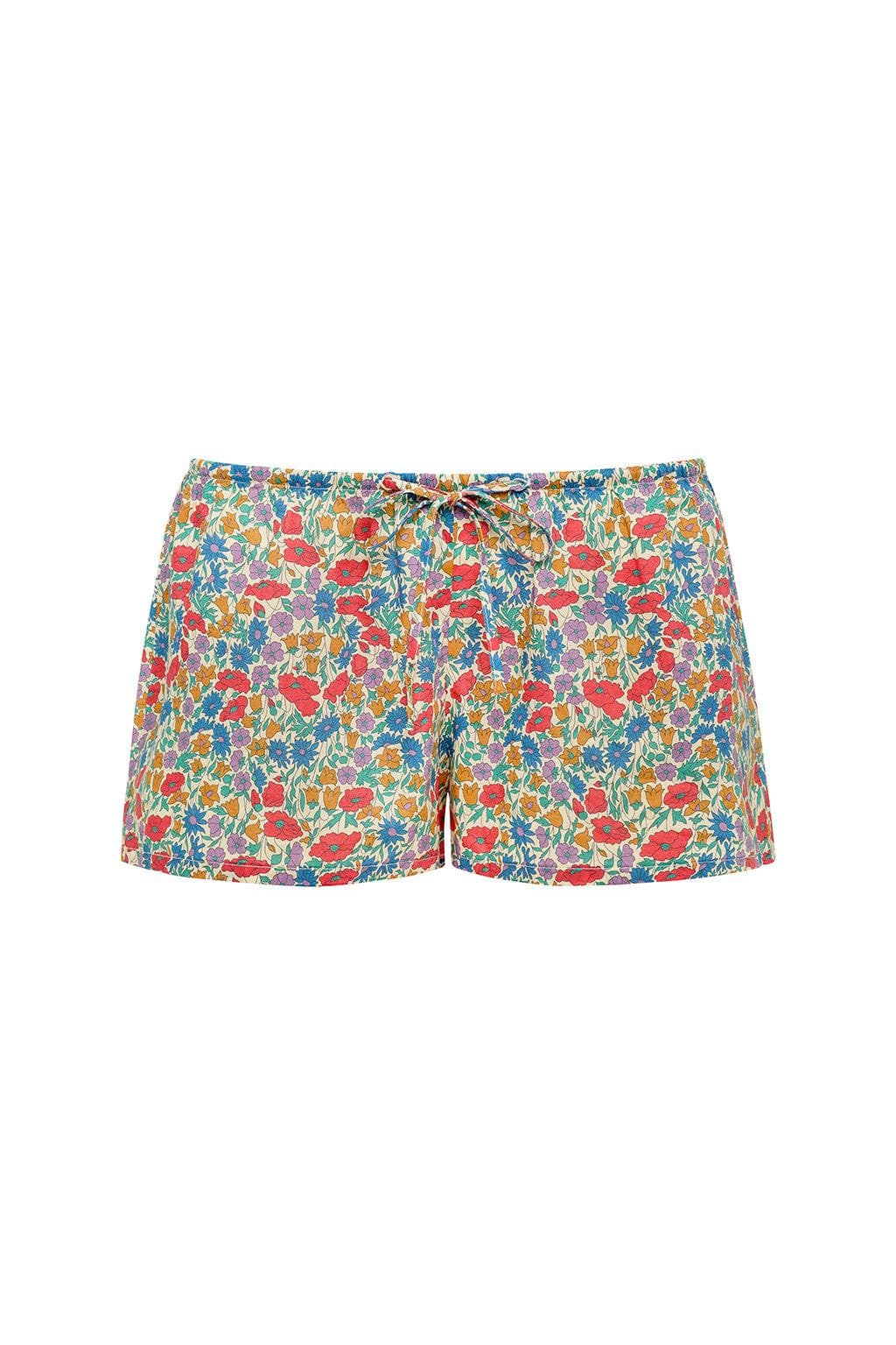 Low-rise drawstring shorts with red, blue, orange, and pink floral print throughout.