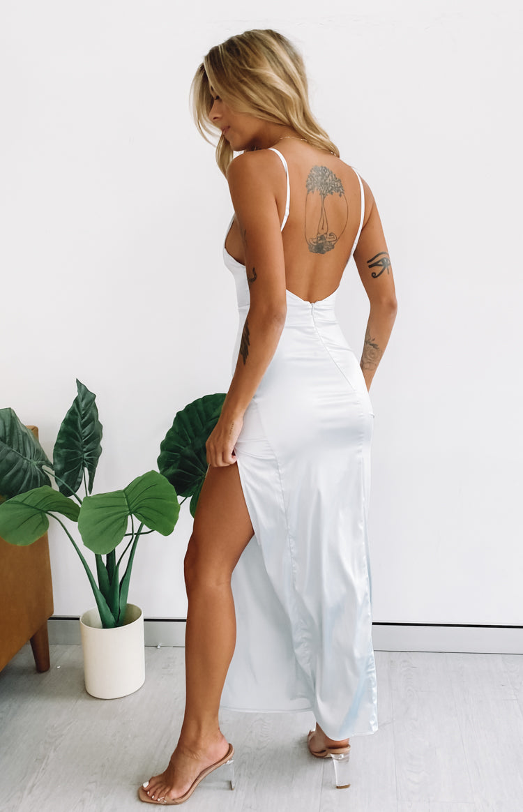 Ice blue silky formal dress with a sweetheart neckline, thin spaghetti straps, and a high side slit