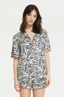 The Zafina Short Sleeve Top in Brush Zebra Print by Ginia