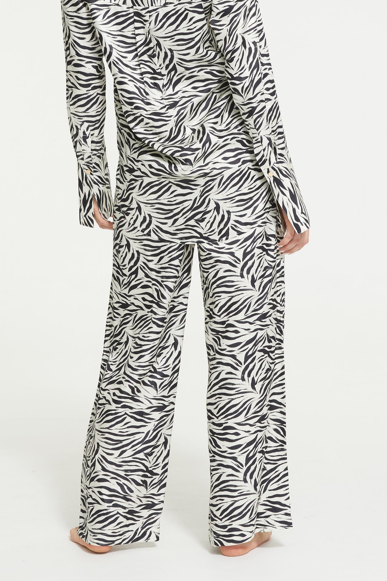 The Zafina Long Pants in Brush Zebra Print by Ginia