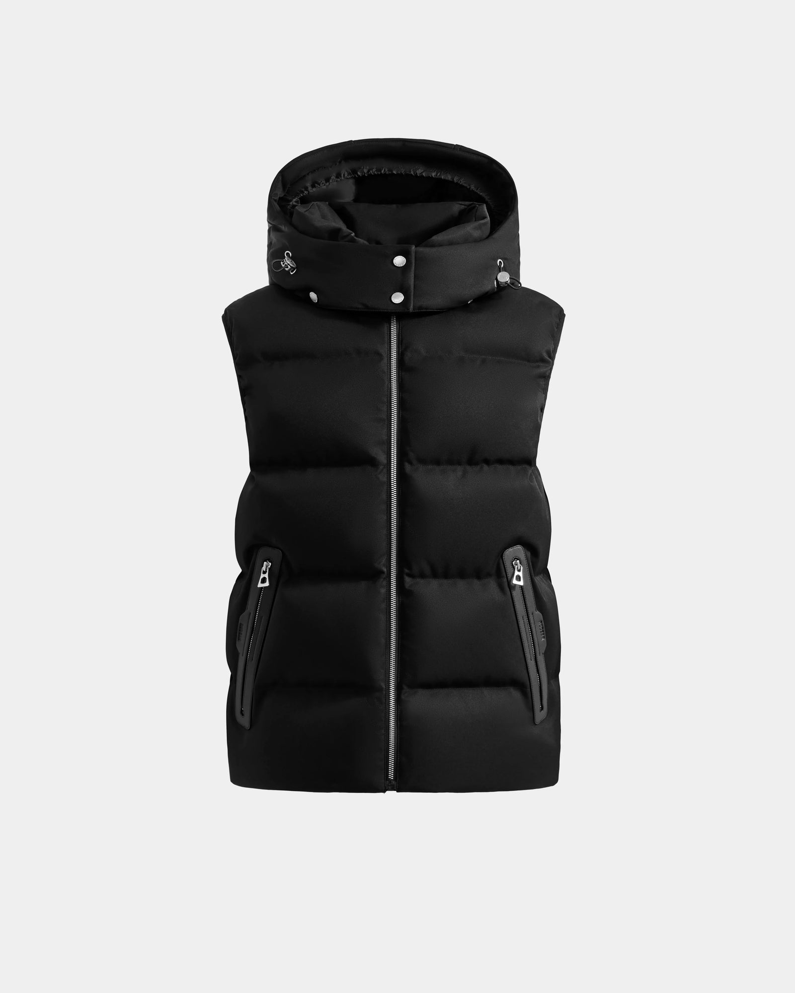 The Rudsak HARLOW - M125528 Black is a sleeveless quilted down vest with a high collar, removable hood, and two zippered side pockets, shown against a plain light gray background.
