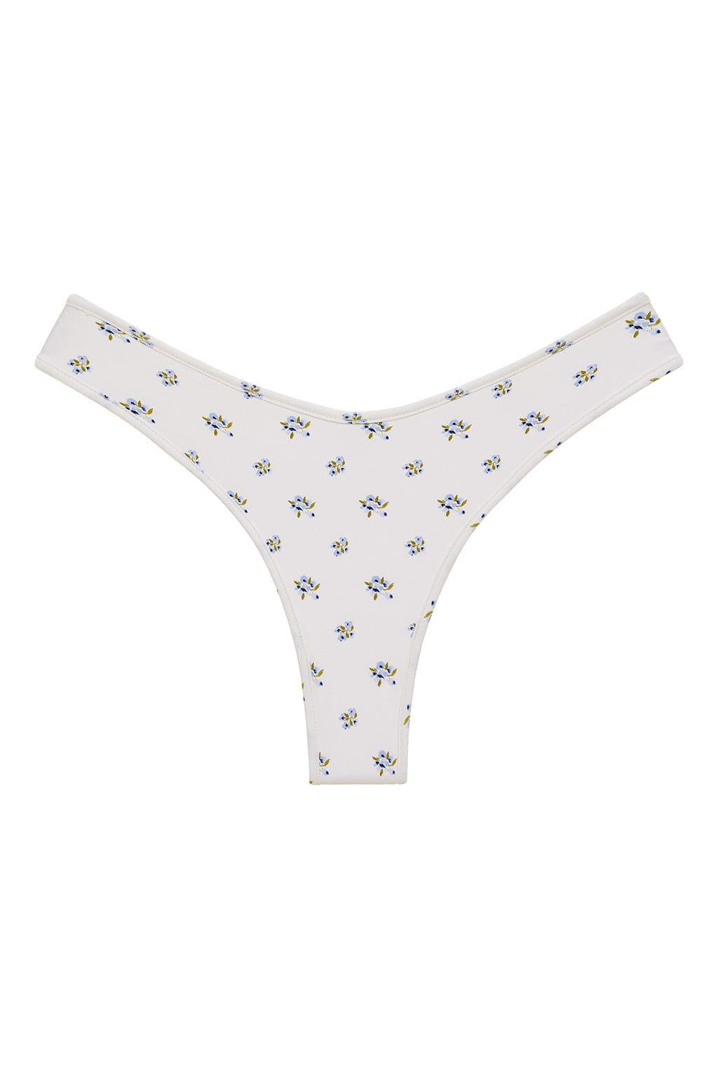 Cream bikini bottom with small blue and yellow floral print throughout.