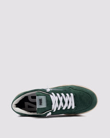 Side angle of green sneakers
