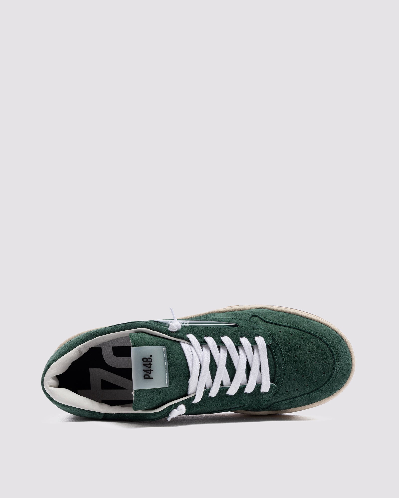Side angle of green sneakers