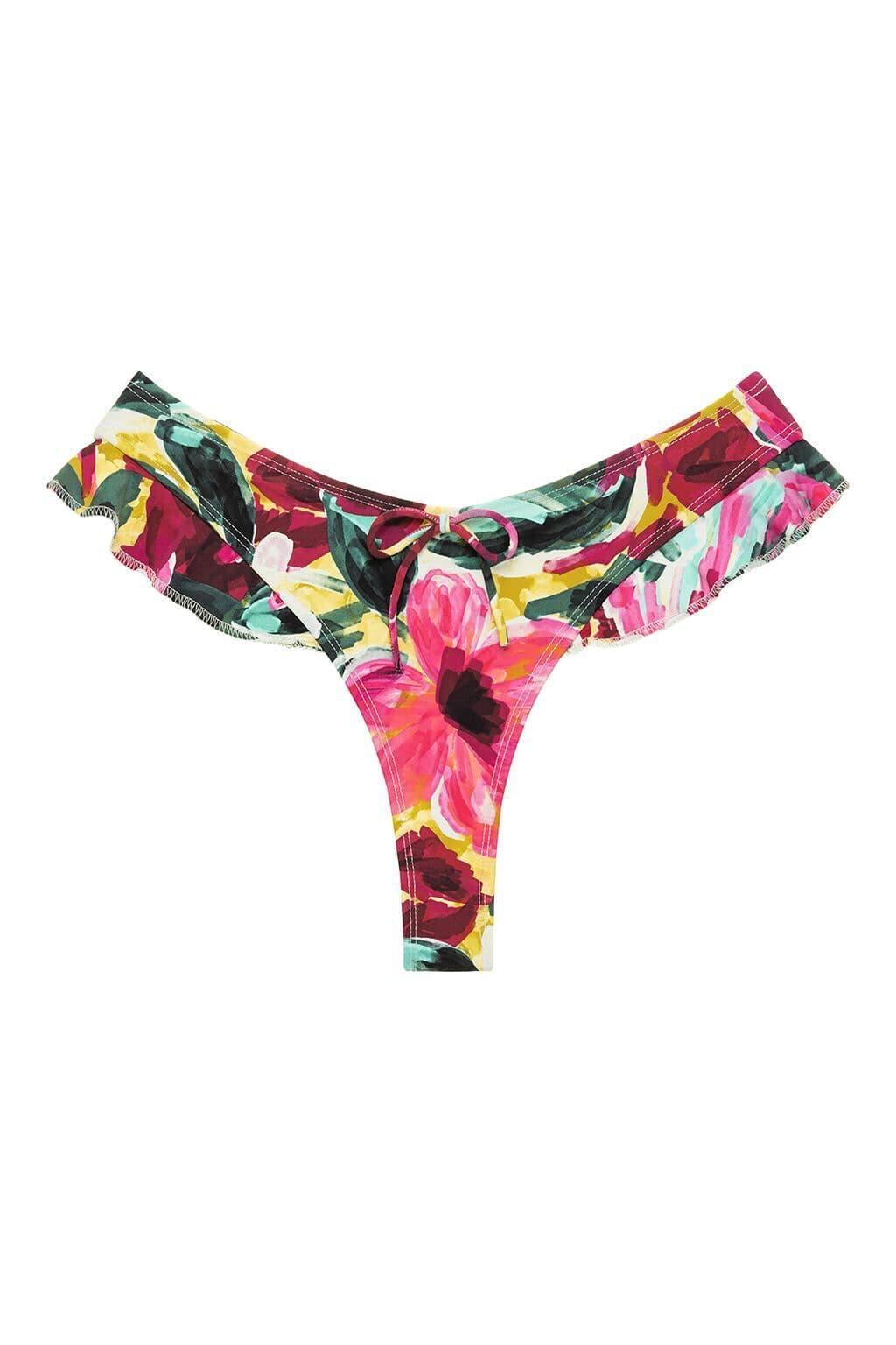 Kelly bikini bottom with vibrant floral print in pink, yellow, green, and black featuring ruffled edges and center tie detail