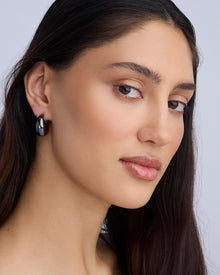 Dylan Micro Huggies earring - product detail shot | gold huggie earrings