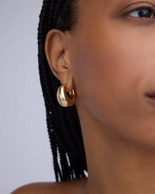 Dylan Micro Huggies earring - close-up detail | gold huggie earrings