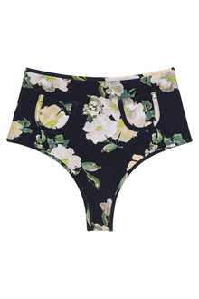 Black bikini bottom with white and yellow floral print, decorative pockets, and metallic trim at waistband.