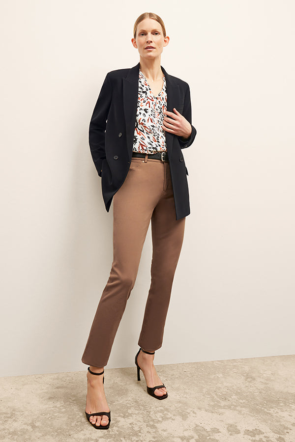 front image of a woman wearing the roma jean in saddle | Exclude