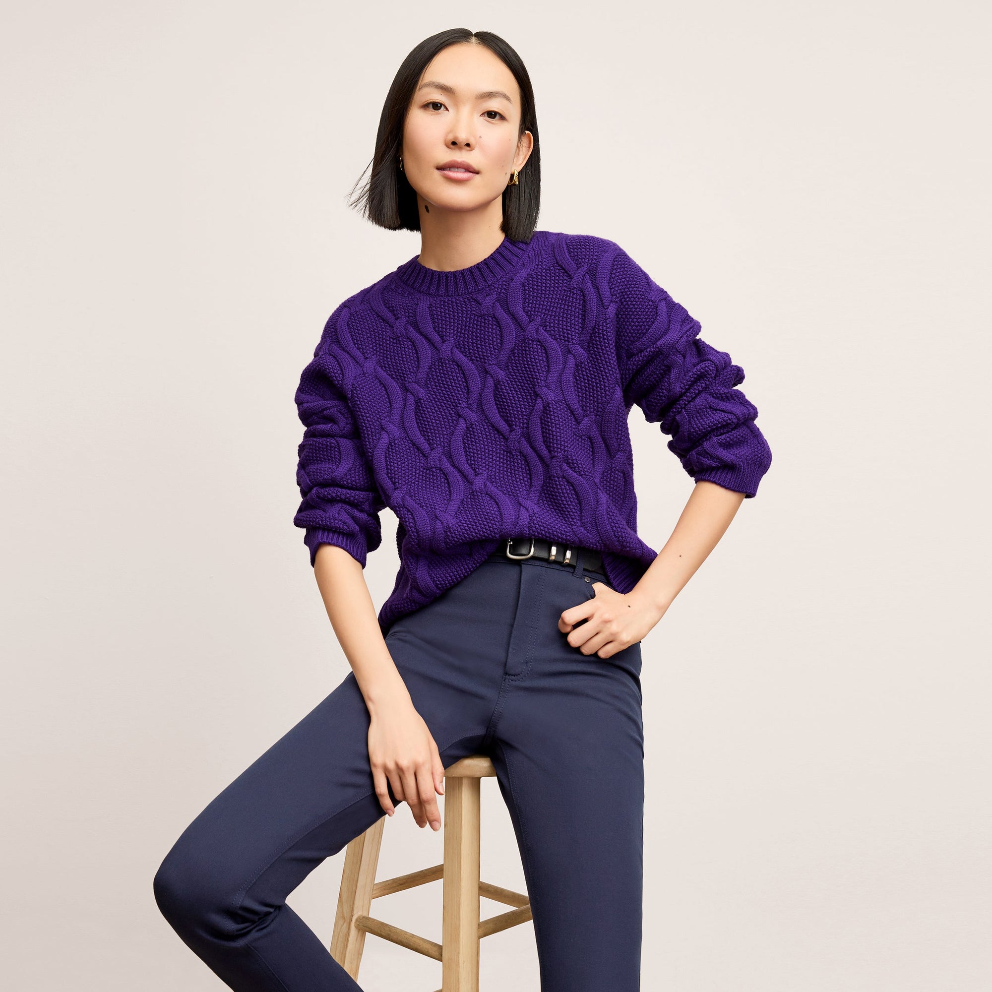 Front image of a woman wearing the Kiki Sweater in Ube | Lead
