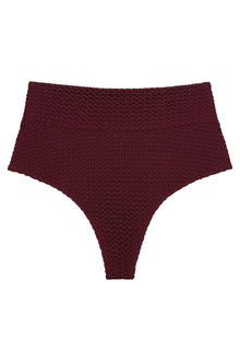 Maroon crochet bikini bottom with textured pattern and high-rise waistband.