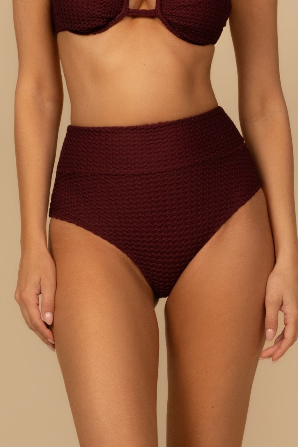 Maroon crochet high-rise bikini bottom with textured fabric and full coverage design.