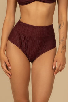 Maroon crochet bikini bottom with high-rise waistband and textured knit fabric.