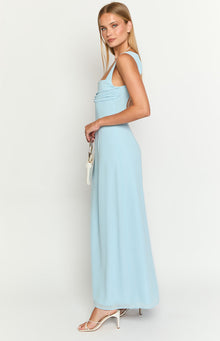 Side view of a light blue maxi dress with a ruched bust, square neckline, and flowing skirt