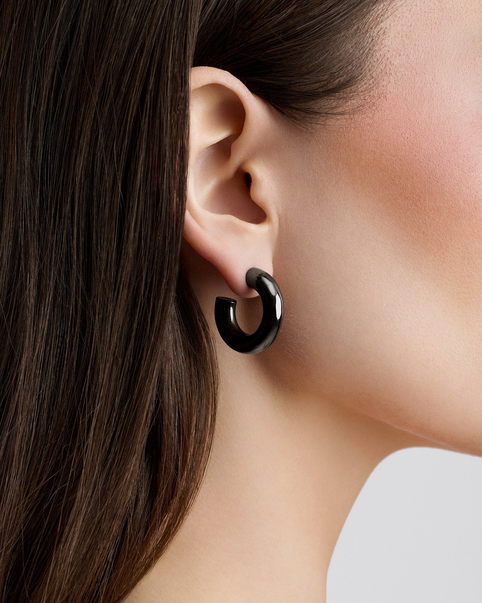 Natasha Micro Huggies earring - close-up detail | gold huggie earrings