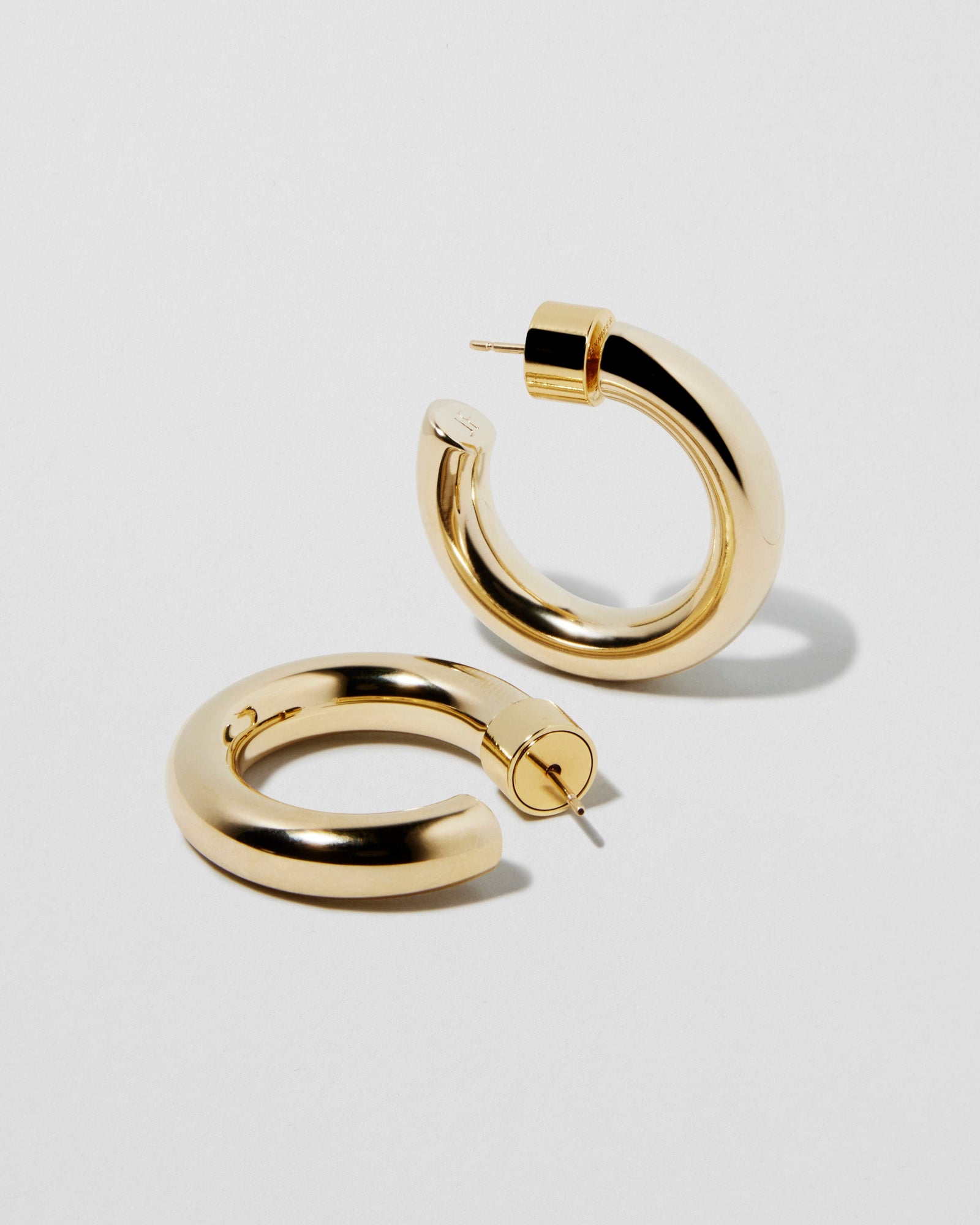 Natasha Huggies earring - styled on model | gold huggie earrings