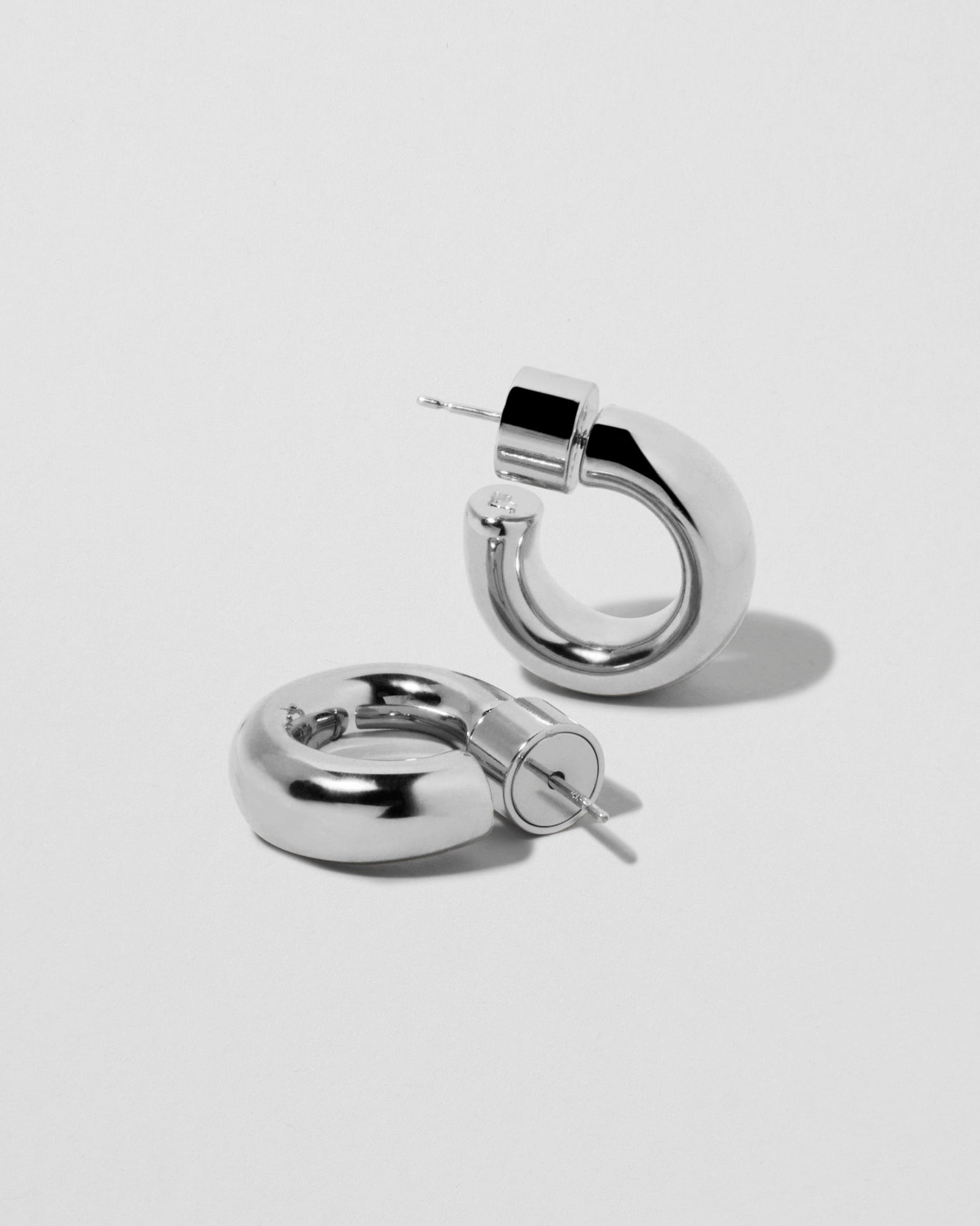 Natasha Micro Huggies earring - back view | gold huggie earrings