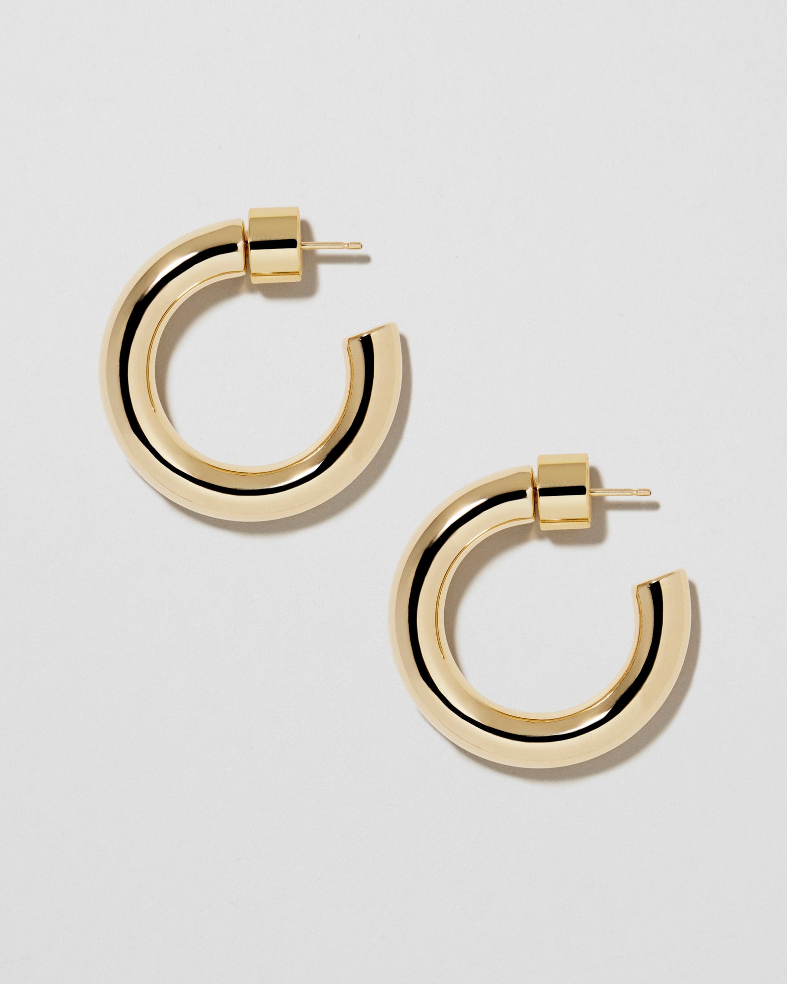 Natasha Huggies earring - front view | gold huggie earrings