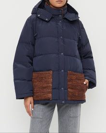 Pippa Puffer Coat in navy nylon and brown wool and Molly Workwear Jean in grey denim.