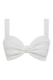 White textured bikini top with bow detail at center and adjustable shoulder straps.